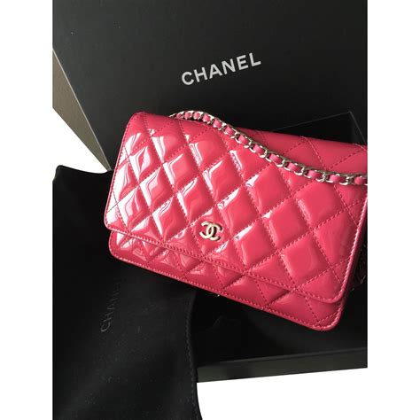 chanel pink wallet on chain.